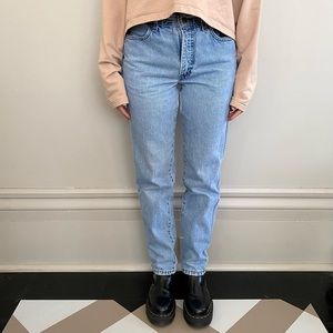 Vintage U.S.A made Harley Davidson high-waisted light-wash jeans. 💙